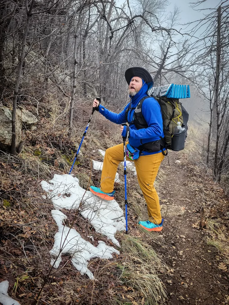 Day 1  and Tom pretended to be devastated by a small pile of snow on trail.