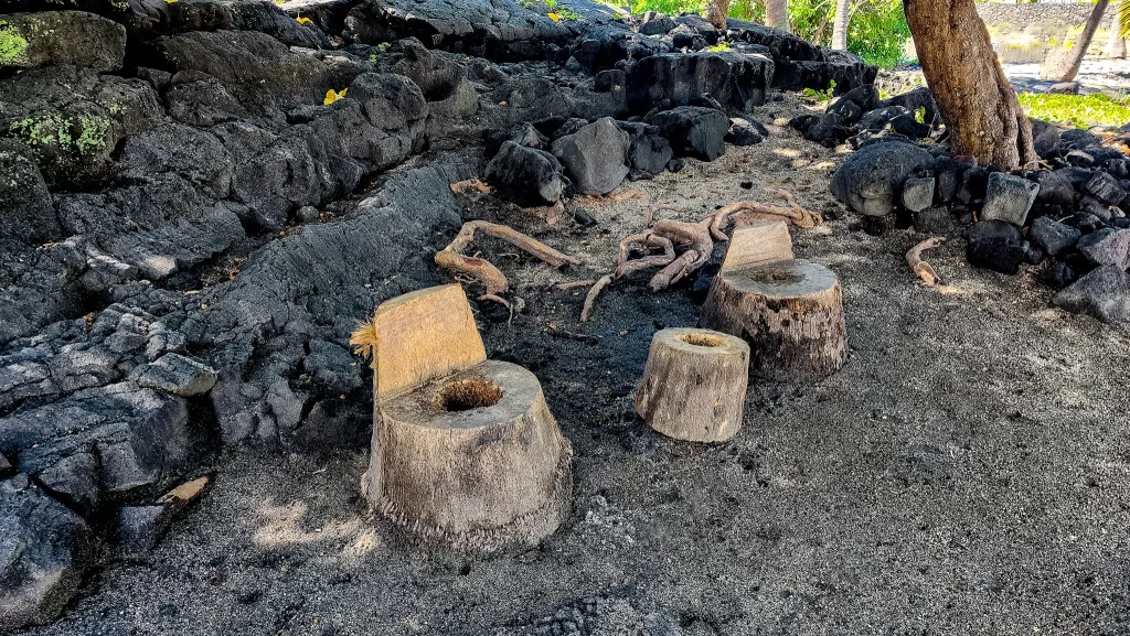 Rough-cut chairs at Puʻuhonua o Hōnaunau National Historical Park.