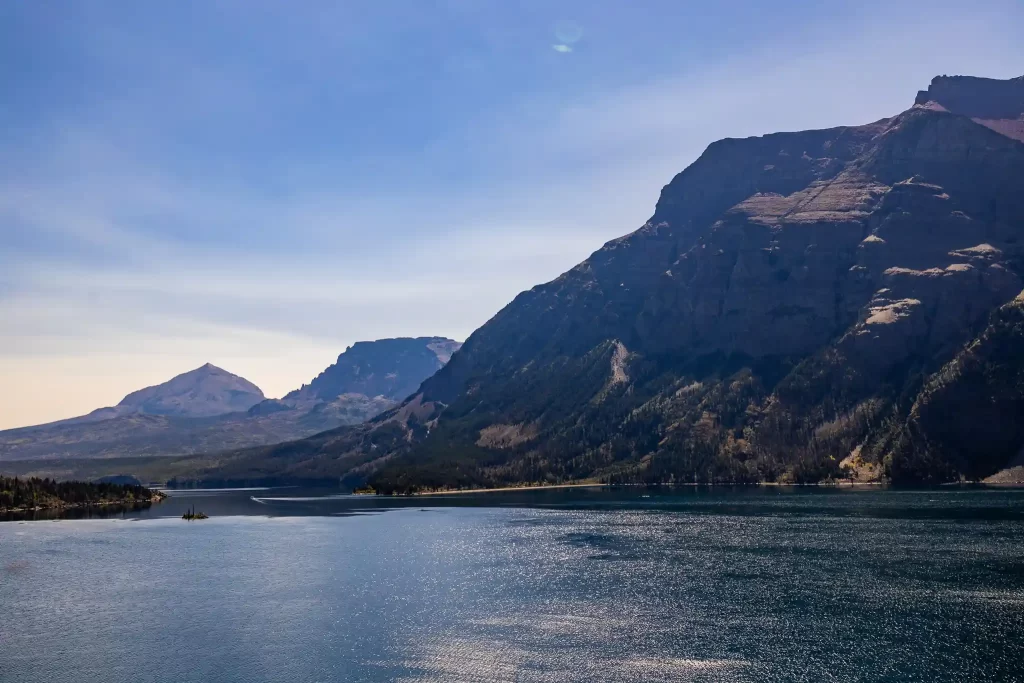 Blue-green water of the massive upper St. Mary Lake in Montana.