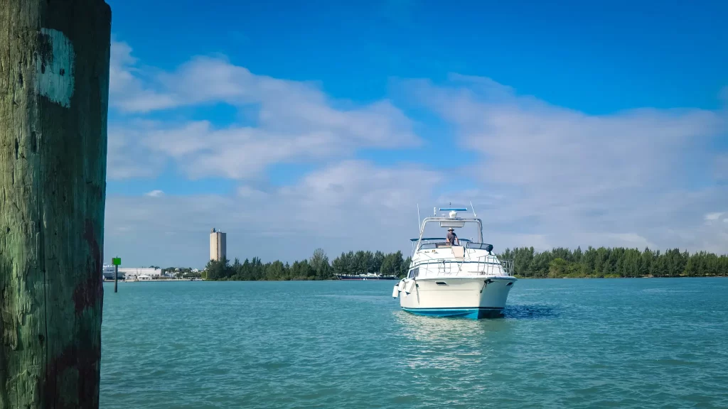 Tom approaches Summerlin Dock in our motor yacht.