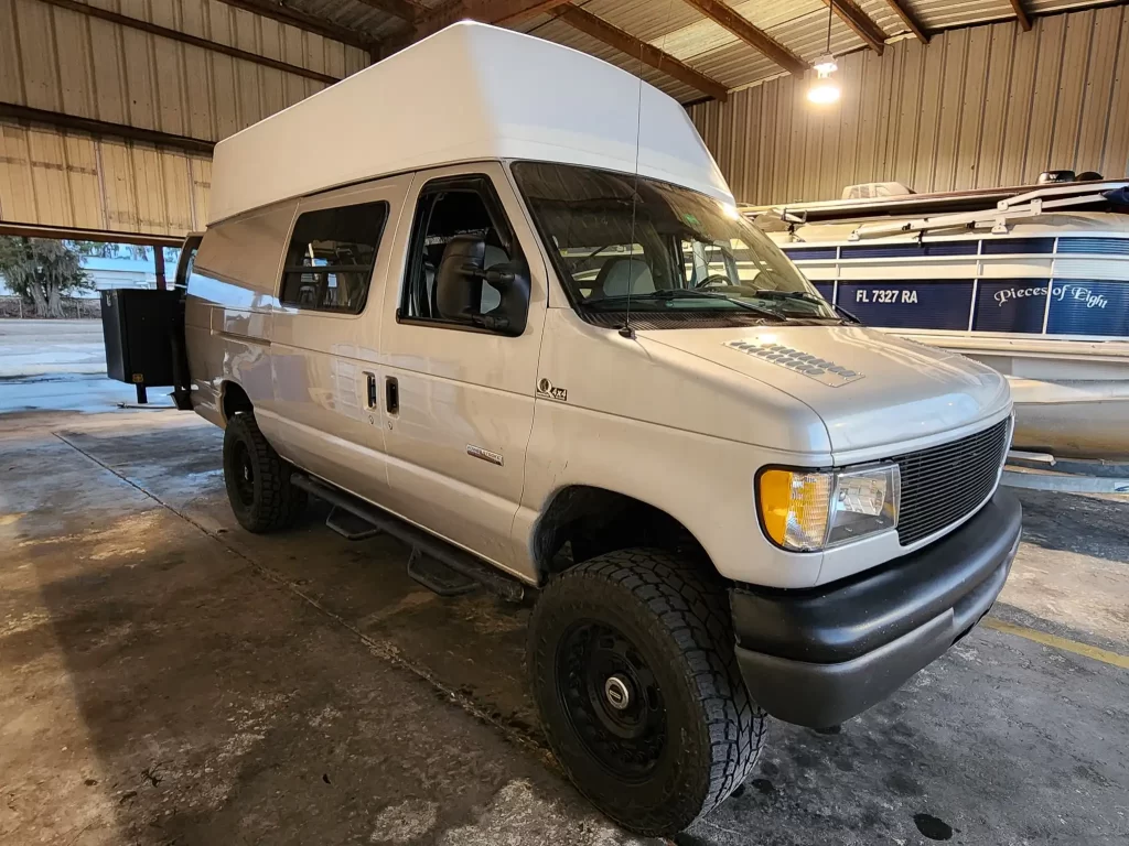 Van high top from a junk yard, before being wrapped to match the van body.