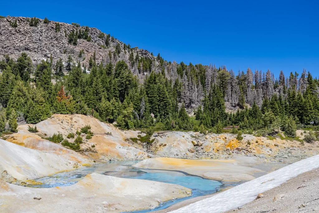 Turquoise pools of snowmelt at Bumpass Hell.