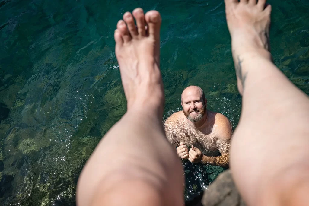 Tom enjoying a refreshing swim in Cushman Lake.