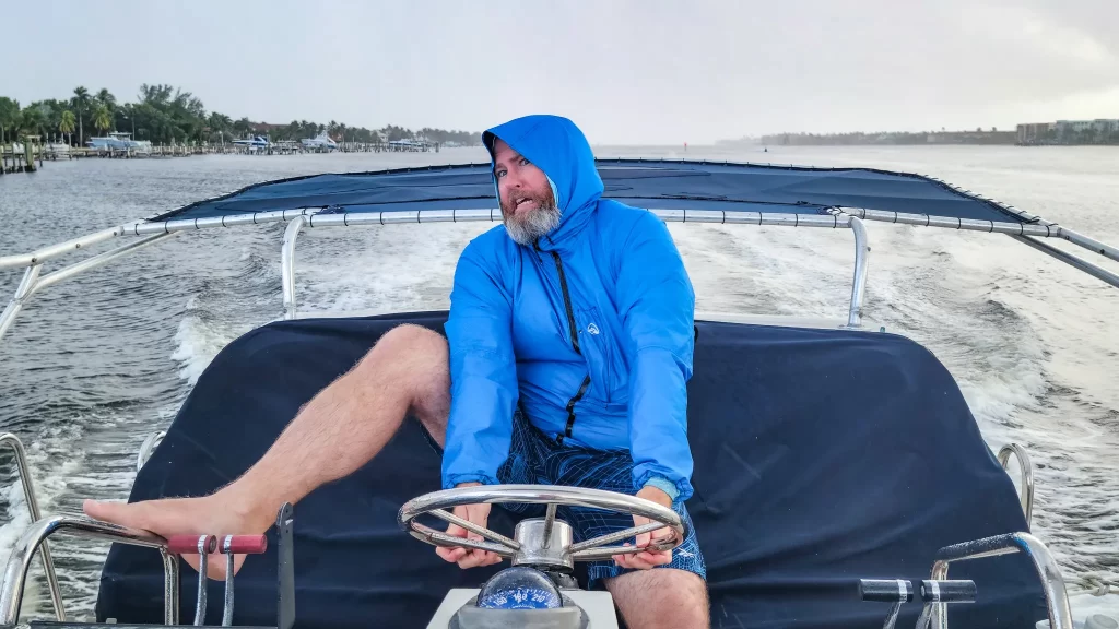 Captain Tom driving crazy on our motor yacht.